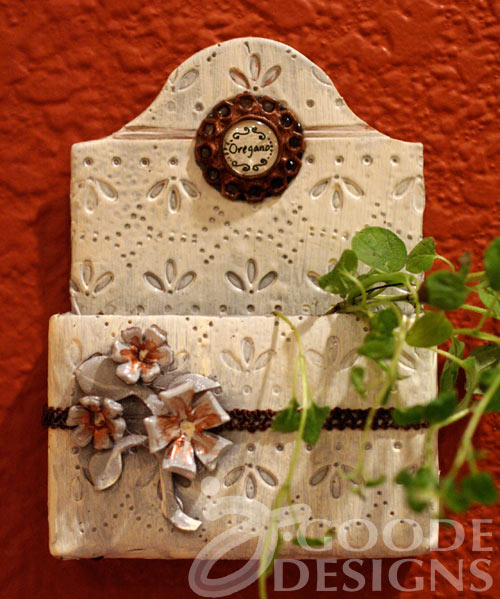 Clay wall hanging flower pot by Jen Goode using Eileen Hull's Caddy die by Sizzix Clay wall hanging flower pot by Jen Goode using Eileen Hull's Caddy die by Sizzix